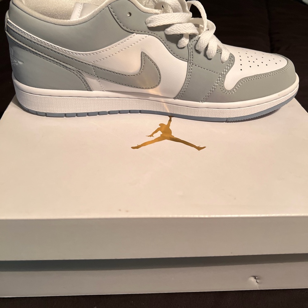 Jordan women’s Low-Top Sneakers in Light Gray and White